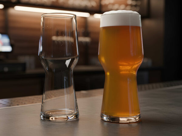 2 ipa beer glasses, one full one empty