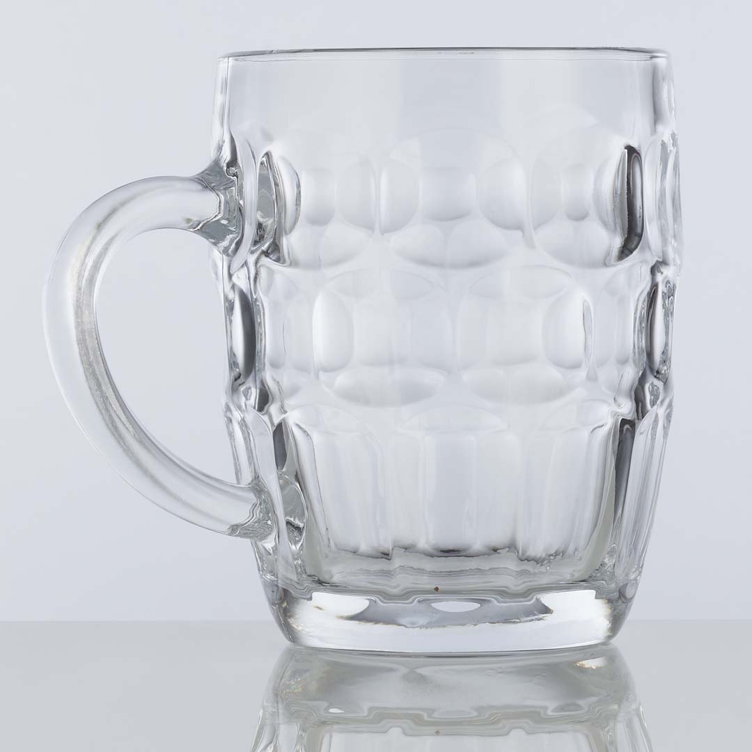 19oz dimpled beer mug on a table with burgers
