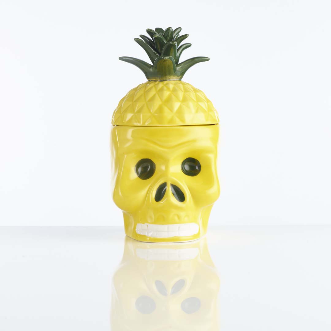 A 21 ounce yellow pig skull tiki glass with a pineapple lid. A truly unique tiki glass